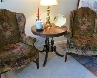 PAIR OF WING CHAIRS WITH CIRCULAR MANOGANY TABLE