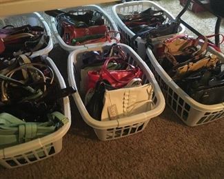 New with tags women's purses in many colors and styles