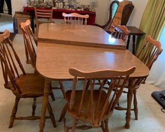 #22	miller furniture co table w 3 leaves and 6 chairs 60-90x40x29	 $200.00 
