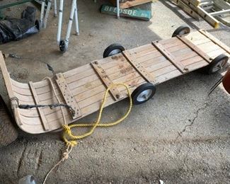 #58	wood sled400 on wheels 	 $75.00 
