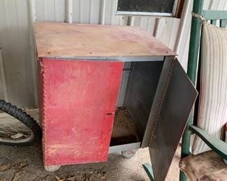 #91	Red metal cabinet on wheels 27x10x31	 $80.00 

