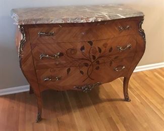 Antique bombe chest with floral wood inlay and marble top, located 8 minutes away in Arlington Heights