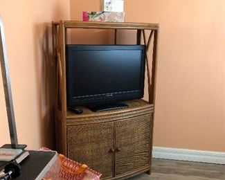 RATTAN ARMOIRE WITH STORAGE. FLAT SCREEN TV  