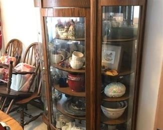 Beautiful antique curved glass, claw feet, Curio cabinet