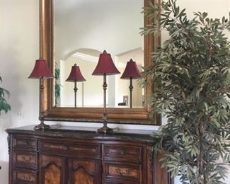 This amazing burl wood hutch is lined with felt in the top drawers.
