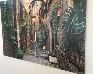 This is a large stretched canvas. It was bought last year at Art in the Park.  There is so much art work available to purchase in this home. 