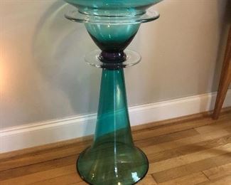 28.5" x 17" blue/green art glass.  Large enough for fish, a plant, or a champagne bucket but stands on its own to complement your decor.  