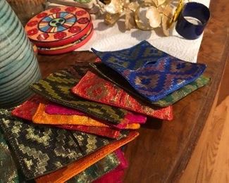 Colorful coasters, napkin rings brighten your place settings.  