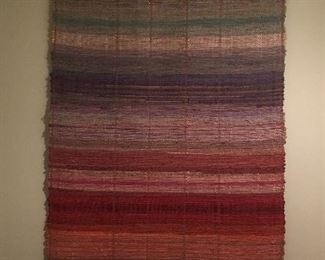 Multi-colored hand woven rug/hanging.  35 x 62"