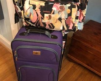 Funky purple & print suitcases
