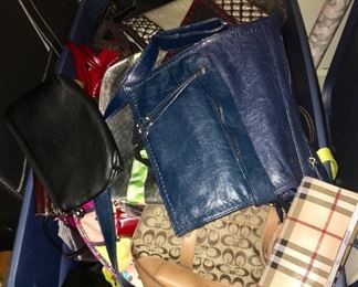 Three totes of handbags