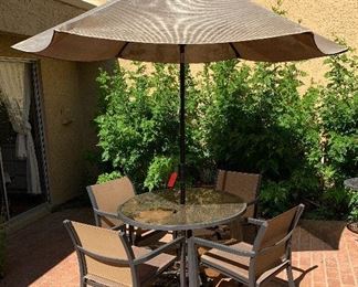 Glasstop Patio Table with 4 Chairs and Umbrella