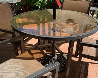 Glasstop Patio Table with 4 Chairs and Umbrella