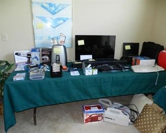 Various items, TV, speakers, blow dryer etc...  