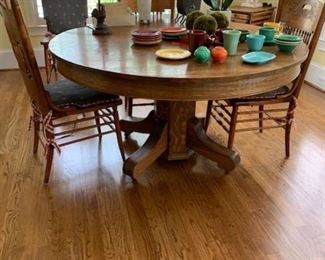 Oak pedestal table and chairs, Fiesta ware dishes