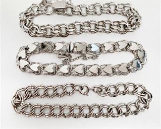 Lot 061 
Sterling Silver Charm Bracelets