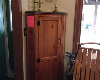 Corner cabinet with glass topper, $75