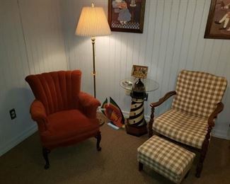 Rust colored arm chair, cute plaid chair with ottoman ,  beautiful antique floor lamp,  Lighthouse table not available.