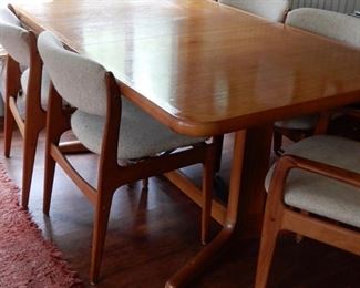 DANISH MODERN TABLE AND CHAIRS WITH SELF STORING LEAVES--WHAT A WONDERFUL SET