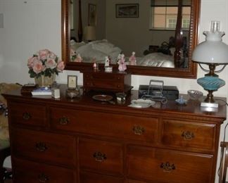 Knotty walnut dresser, nine drawers, 33"x53," with matching mirror