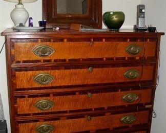 Antique dresser, five drawers, beautiful details. Small antique wall mirror (sold separately).