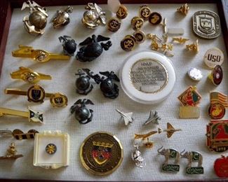 Home-owning family was/is still a military family.  Uniforms, insignias, plaques, photos, magazines, equipment, books, much more. Includes U.S. Naval Academy,  USMC, Navy League, U.S. Department of the Navy,  Marine Corps, Naval Reserve Officers Training Corps, Marine Air Group, George Washington University, St. Thomas Academy,  and more!