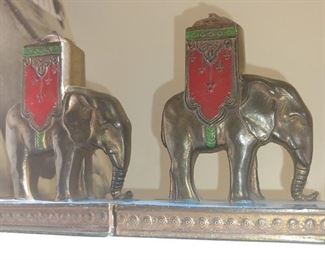 A lovely Royal pair of 1923 L.V. Aronson enameled metal elephant bookends.