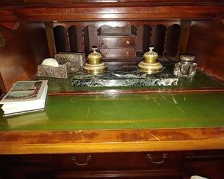 Tucked away fold down desk. Marble Ink Well & Reed and Barton Desk Accessories. 