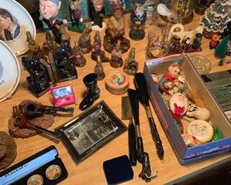 Bobble head and old wooden figurines