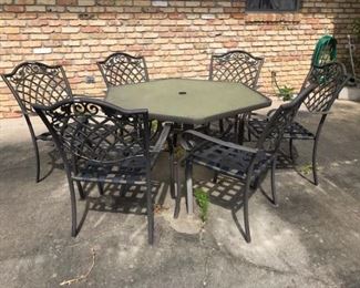 patio table with 6 chairs and glass top