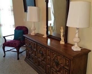 Triple Mediterranean dresser with mirror and upholstered chair.  Lamps not available.