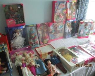Some of the in the box Barbies and other dolls