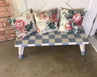 Sweet, homemade, folk-art piece and little kudos like to sit on it-must be the alluring blue N’ white checkerboard. 