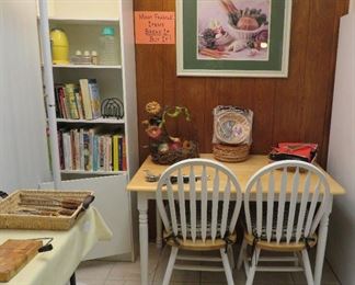 Cookbooks, vintage ice crusher, small table and chairs