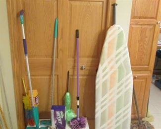Ironing board and cleaning supplies