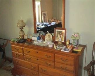 Dresser with mirror and household items