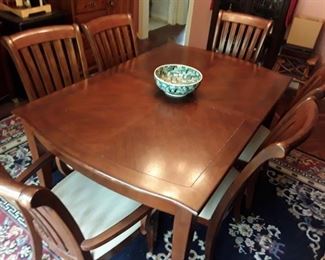 Dining table and 6 chairs. Antique Chinese bowl for sale separately.