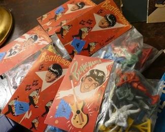 she'll love you, yeah, yeah, yeah! for these unopened beatles figurines. mint. 