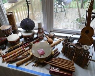 primitive musical instruments collected during globe-trotters' travels. also -- guitar (not shown here)
