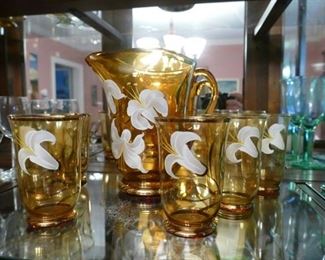 rare to find a pitcher with all six glasses. 19th century /early 20th century handpainted lily motif. beautiful condition! give these a home and display them the way they were meant to be! bohemia glass?