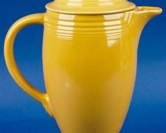 Lot 26 - Fiestaware Yellow Pitcher with Lid