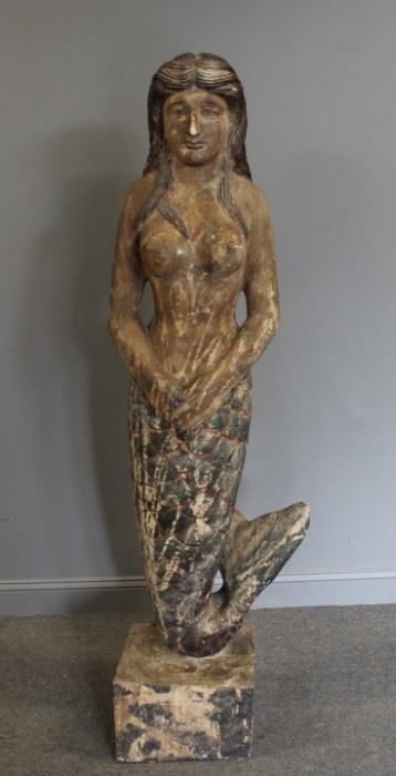 A Large Carved Wooden Gessoed Mermaid Figure