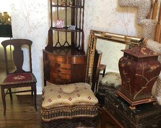 Needlepoint chair, corner unit bookcase with drawers, footstool, mirror and stenciled chest with urn