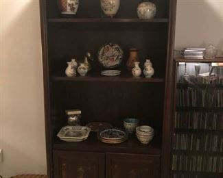 Wall unit with applied oriental motiff