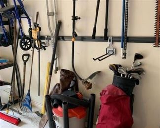 yard tools, rolater, gold clubs, shop vac