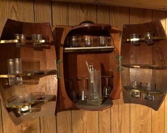 Barrel wall bar opened with glasses