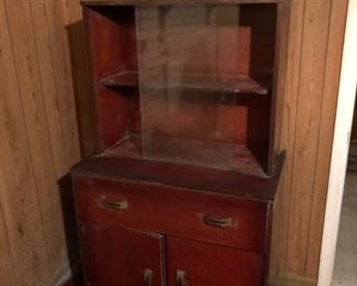 Smal Mid Century Glass Front China Cabinet.  We'll have it all cleaned up and waiting for you