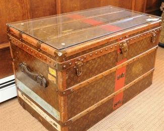 c. 1930 Louis Vuitton trunk. No trays present. Measures 36" long, 21" front to back, 22.5" tall. Repairs made to face plate, "Louis Vuitton" inscribed nailheads are not present. No serial number present. Please call with questions.