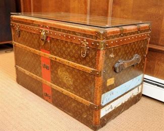 c. 1930 Louis Vuitton trunk. No trays present. Measures 36" long, 21" front to back, 22.5" tall. Repairs made to face plate, "Louis Vuitton" inscribed nailheads are not present. No serial number present. Please call with questions.