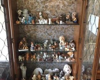 CURIO CABINET WITH LOTS OF COLLECTIBLE CATS AND DOG FIGURINES